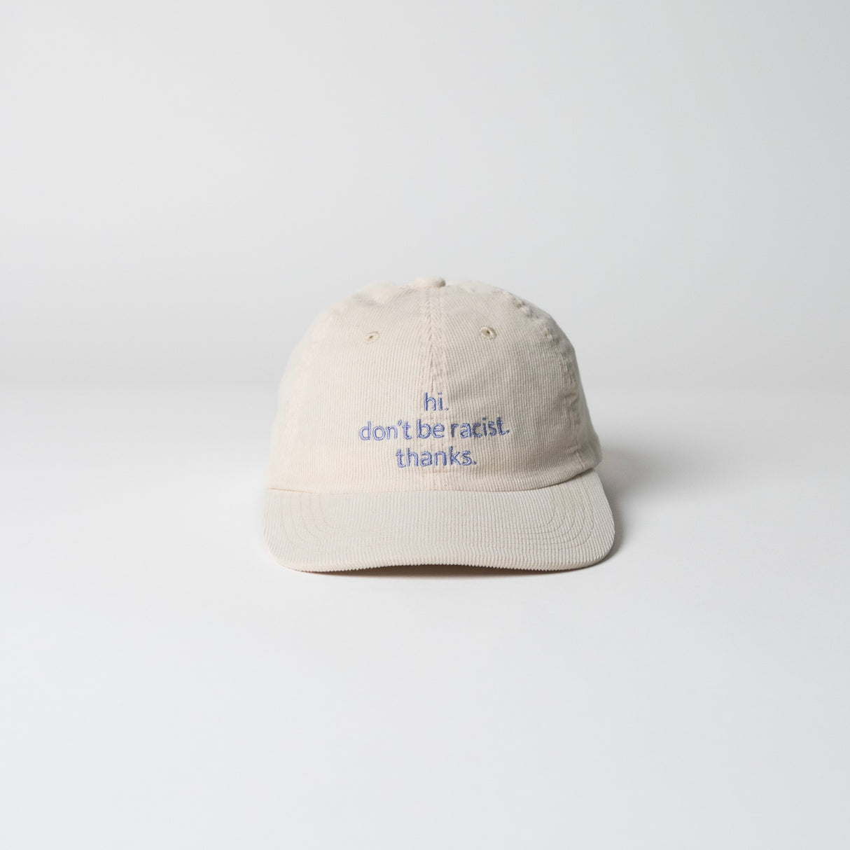 arrel Kappe “Don’t Be a Racist” Beige/Lavendel | Klare Botschaft | arrel