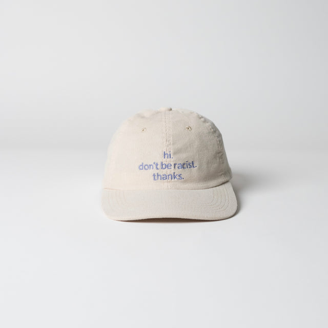 arrel Kappe “Don’t Be a Racist” Beige/Lavendel | Klare Botschaft | arrel