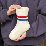 UPSIDE STORIES Vase “The Lost Sock” | Originelles Design | UPSIDE STORIES