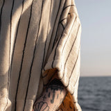 BONGUSTA Poncho „Naram Creme & Ink“ (S/M) | BONGUSTA | Gestreifter Poncho
