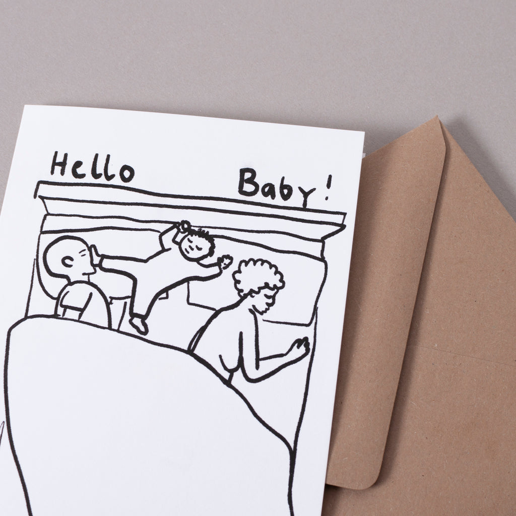 Superjuju Grußkarte "Hello Baby im Bett"